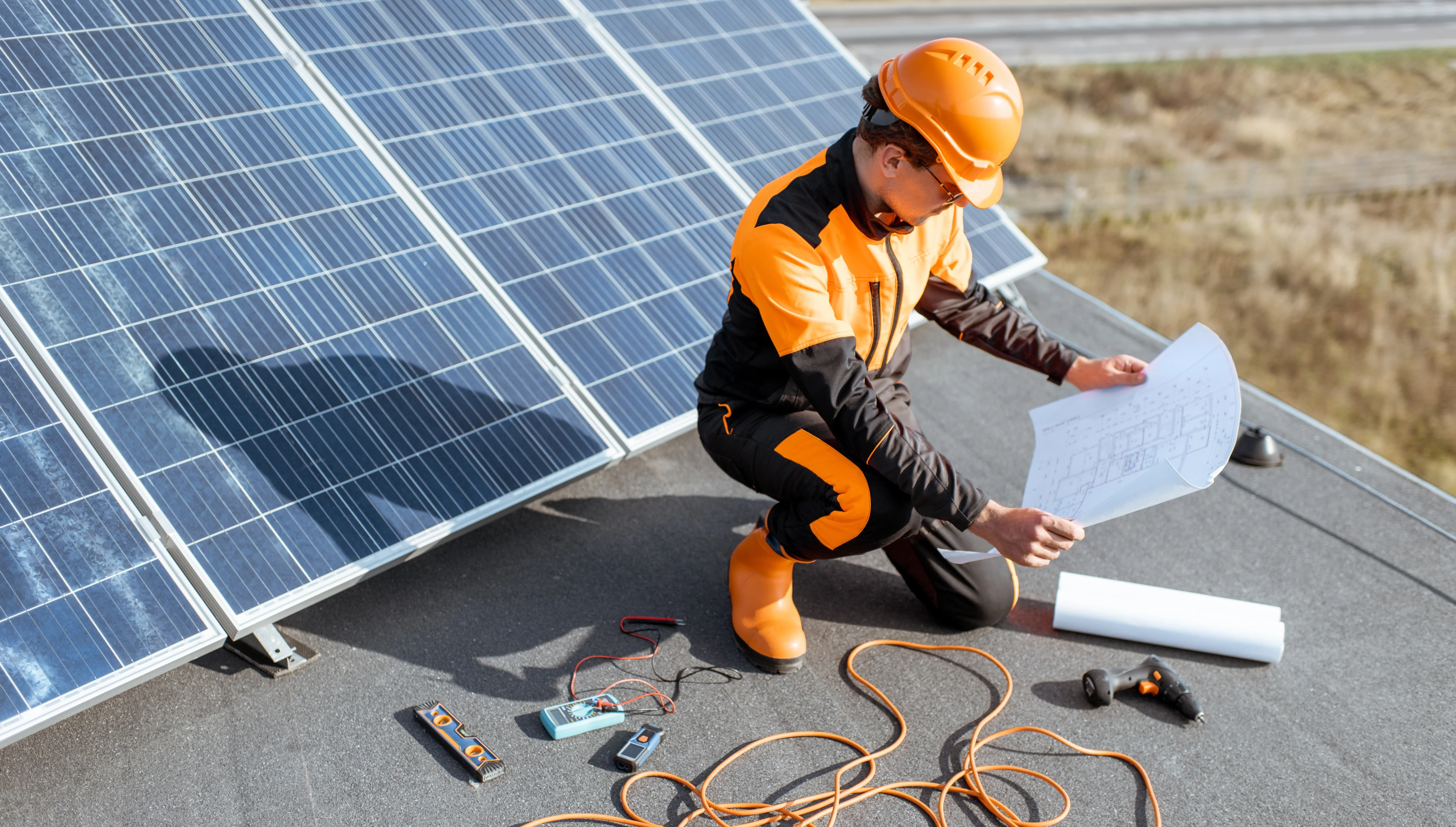 electrician-installing-solar-panels-2021-09-02-01-01-46-utc (1).jpg