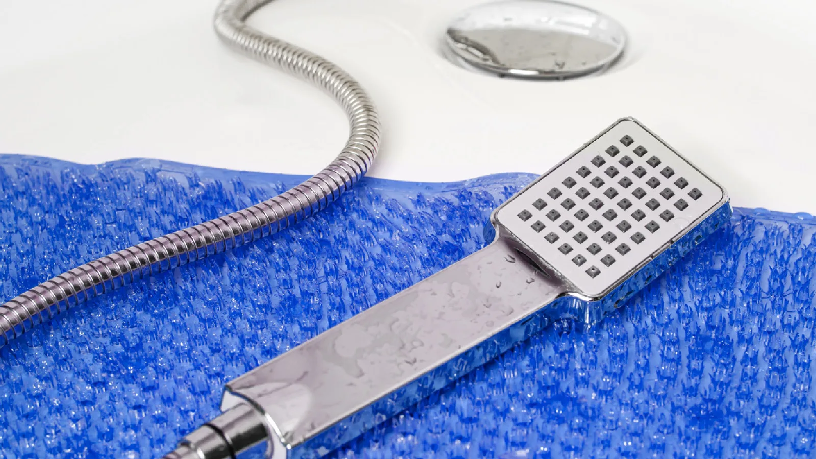 Shower head on a bathmat