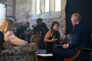 Alessia Francischiello on set discussing with actors