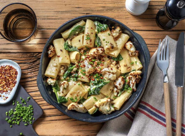 cheesy creamy cauliflower pasta with baby spinach