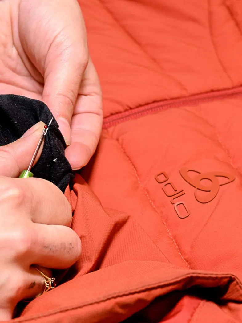 Odlo Jacket being repaired