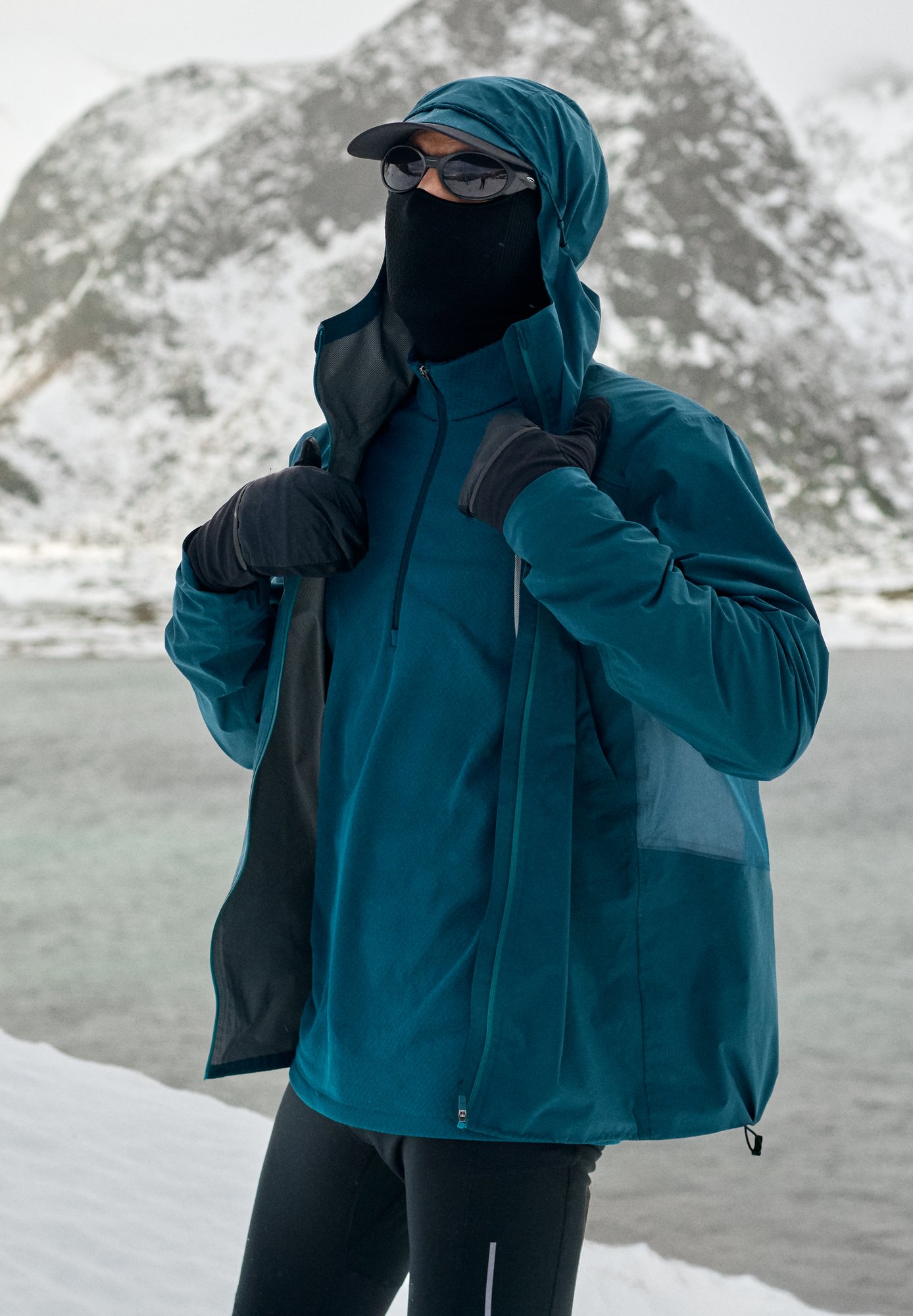 FW26 Winter Running Guide shoppable portrait X-Alp Pro WP jacket men reflecting pond De