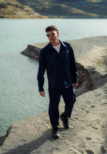 Shop the look Outdoor brand men graphic mid layer outfit SS26 