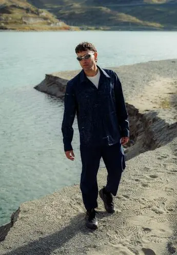 Shop the look Outdoor brand men graphic mid layer outfit SS26 