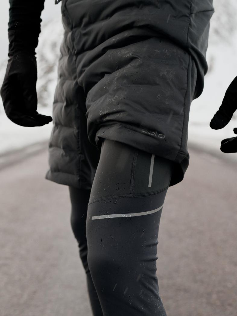 FW26 Road Running men in Zeroweight running tights and Zeroweight insulated shorts in black 