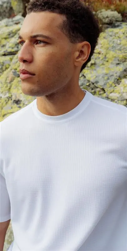 SS26 Performance Reinvented CLP Hero Tout Grid men in white Cubic Light