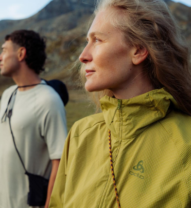 SS26 Explore landing page half tout grid About Odlo hiking landscape