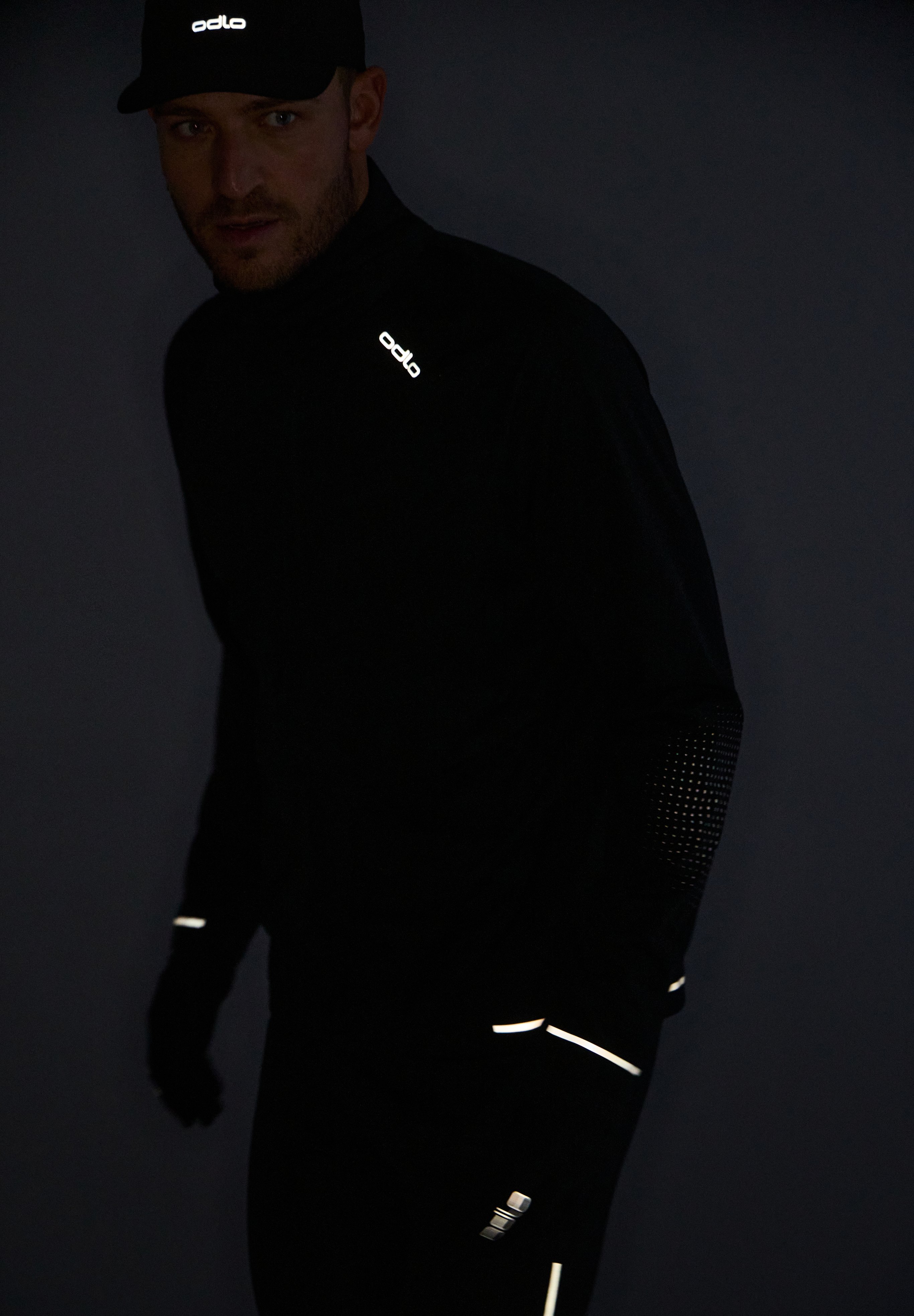 FW26 Running in the dark Shoppable Portrait Zeroweight Pro Windproof Reflective Running Jacket D