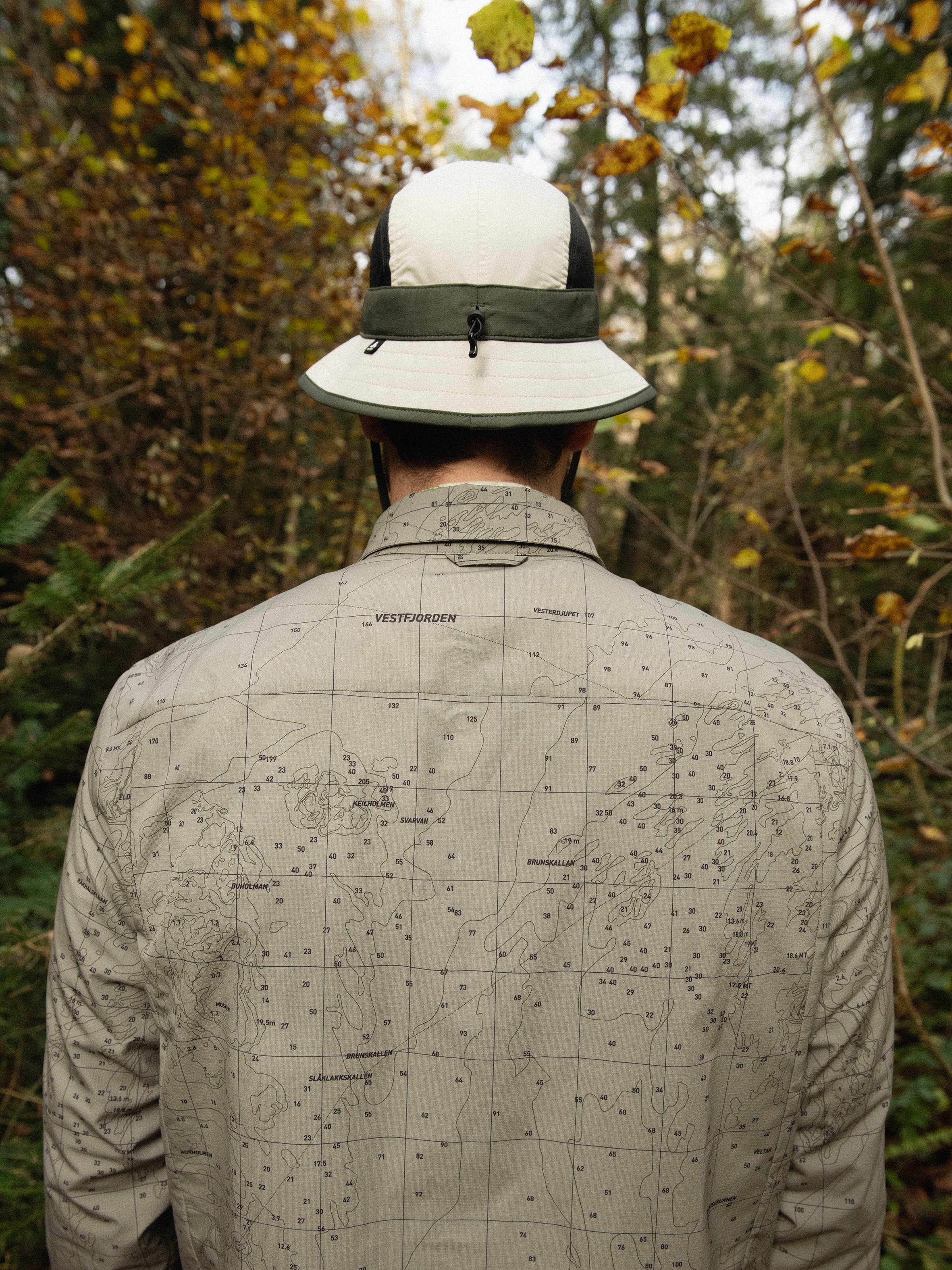 SS26 Shifting Elements CLP half tout grid Transition reversible insulated long-sleeve shirt