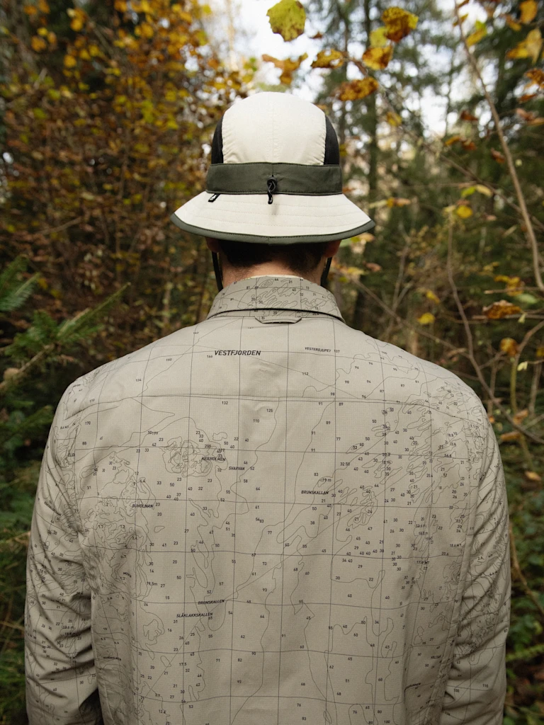SS26 Shifting Elements CLP half tout grid Transition reversible insulated long-sleeve shirt
