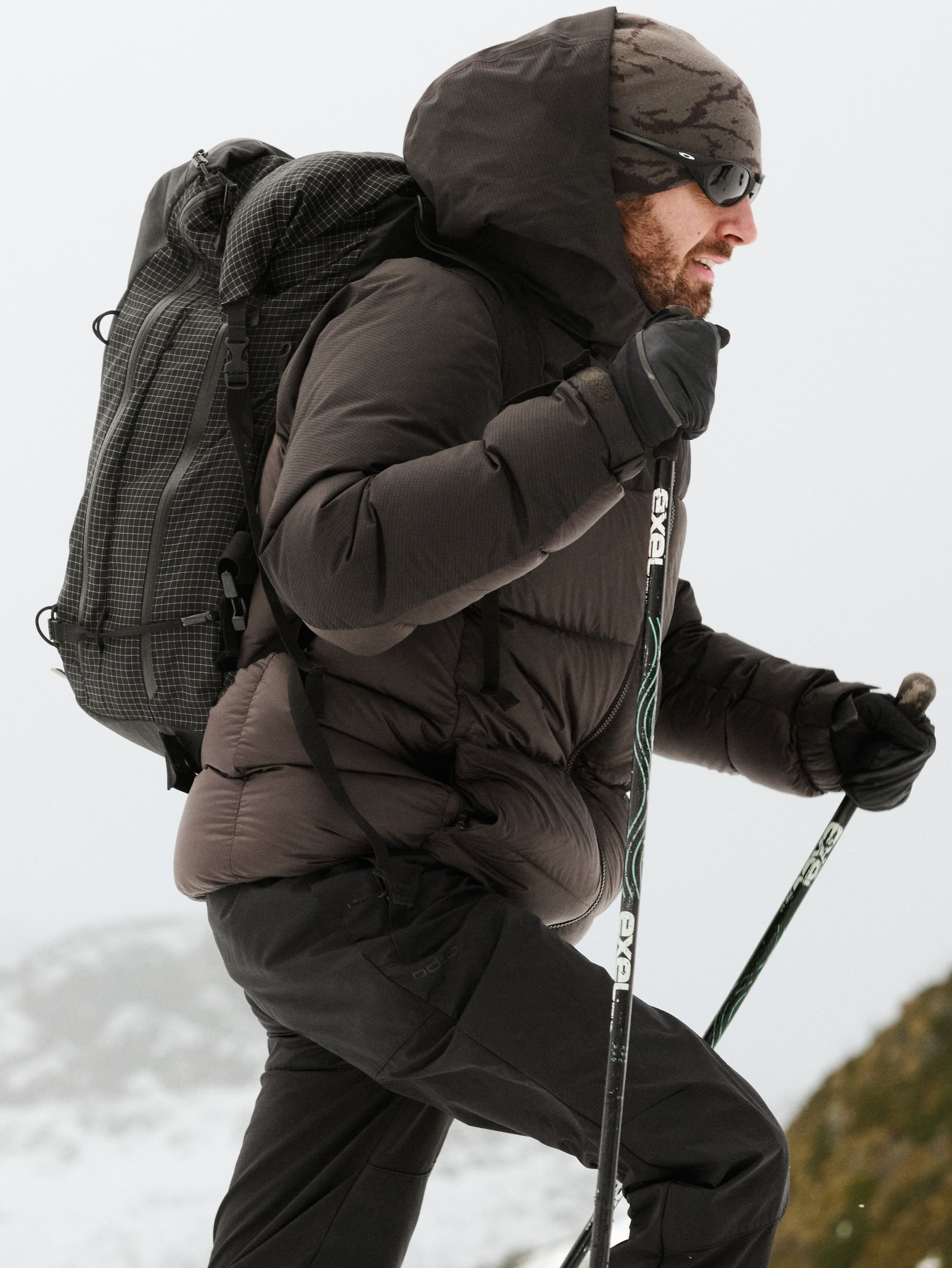 care guide down jacket tout grid FW26 D