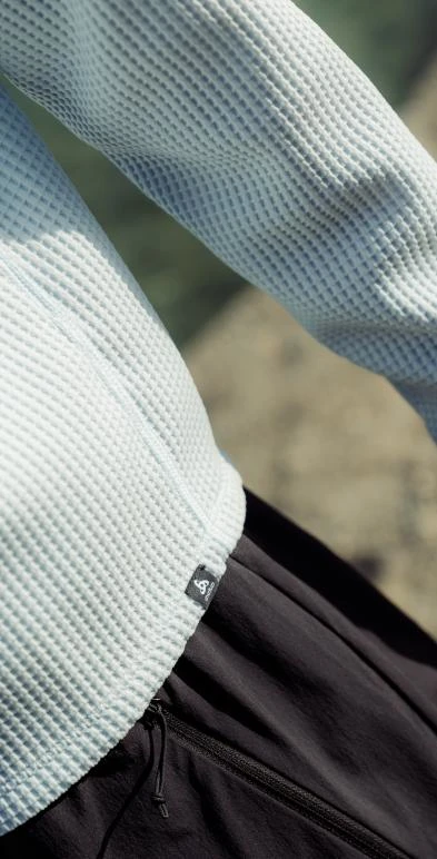 light blue waffle-textured long-sleeve mid layer