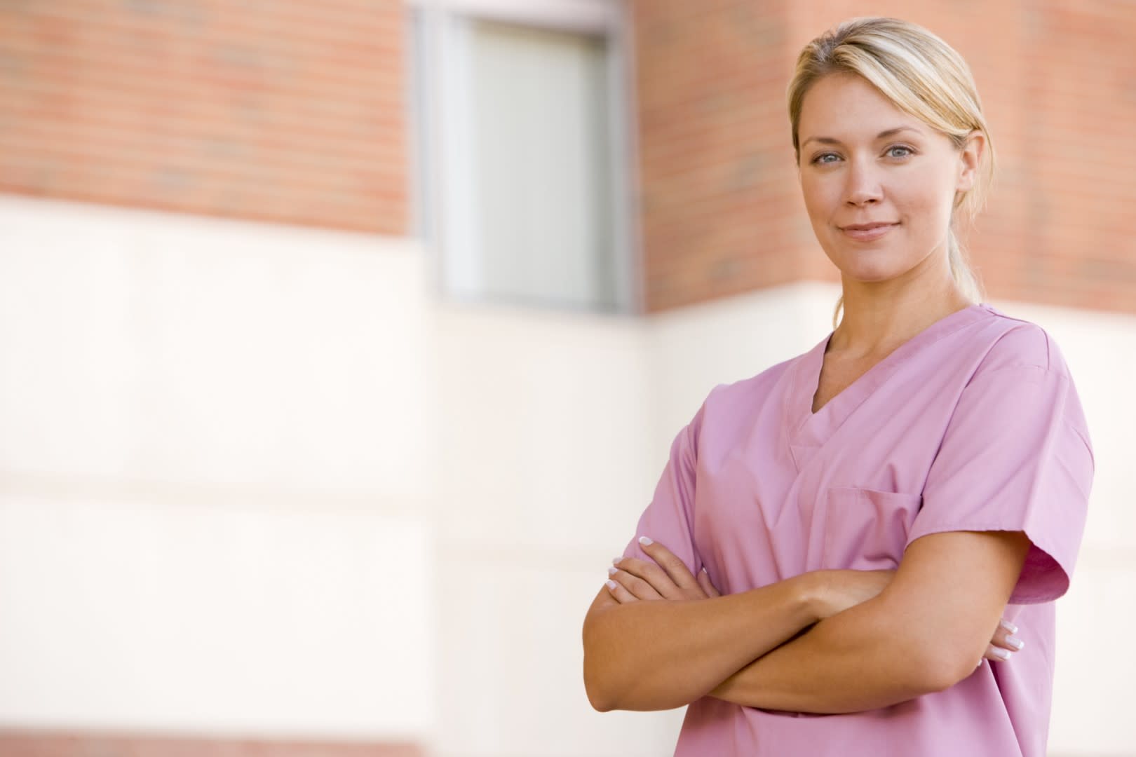 nurse-in-pink-scrubs.jpeg