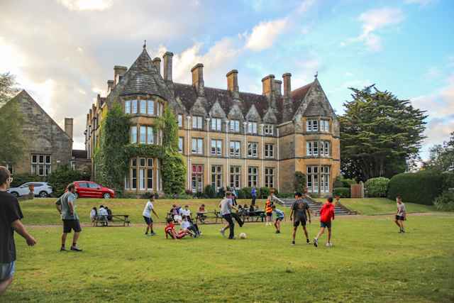 Sherborne International Summer School - Students plaing football on campus Sherborne International Summer School - Students plaing football on campus