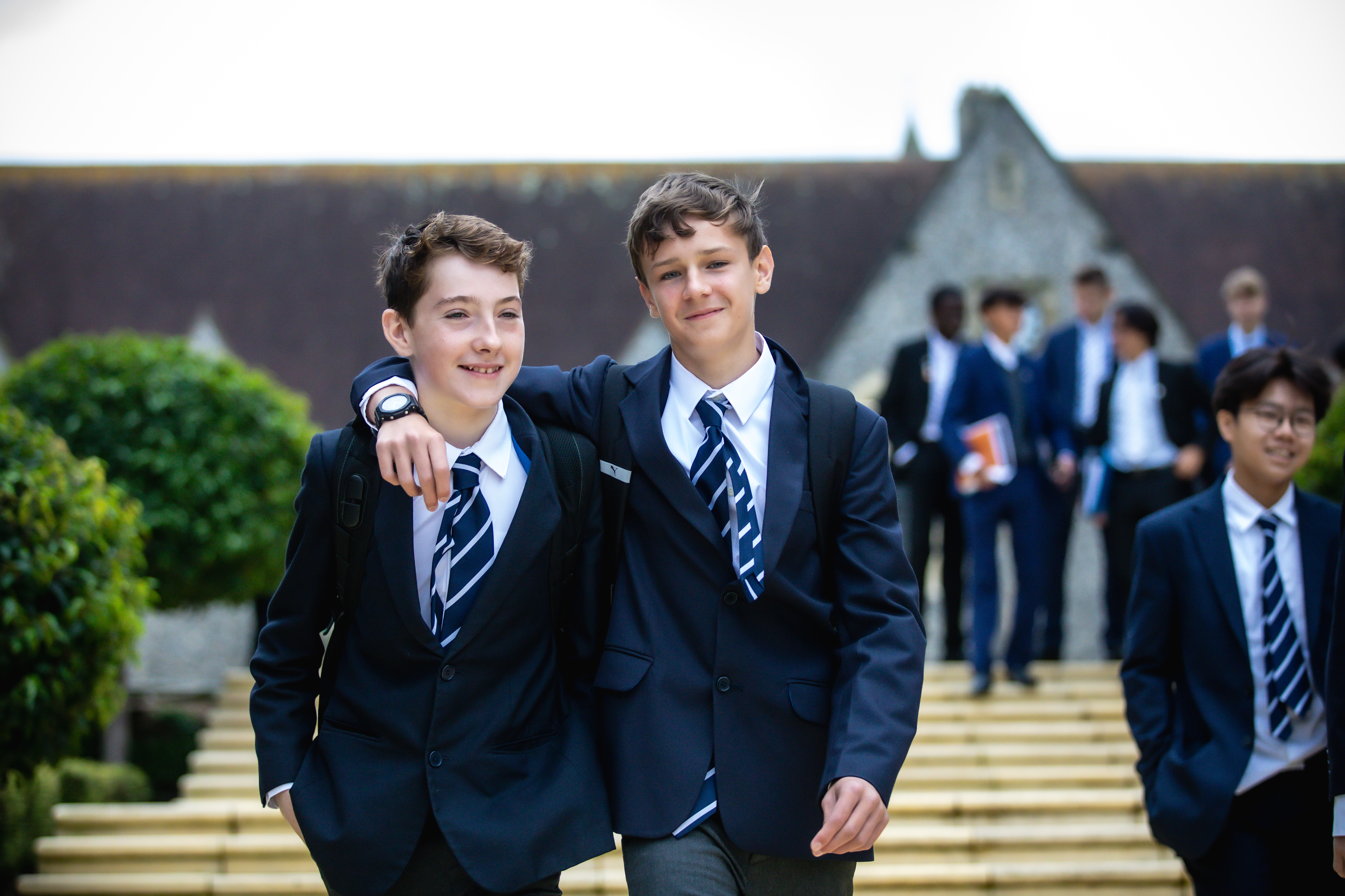 Lancing College - Boys walking to lessons arm in arm