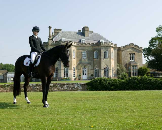 Stonar School - Horse and rider in front of the main building