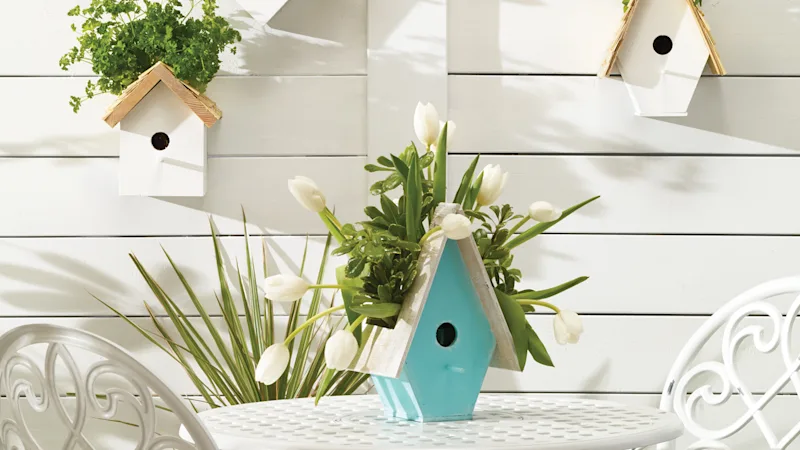 Light blue birdhouse planter