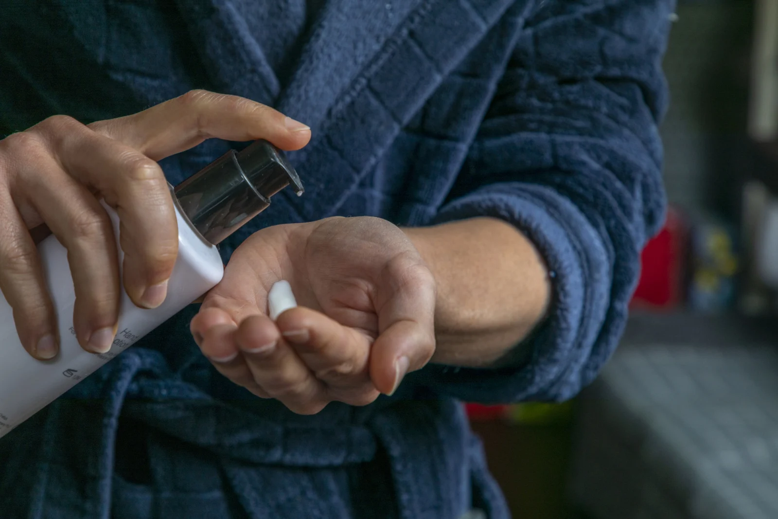 Someone applying handcream