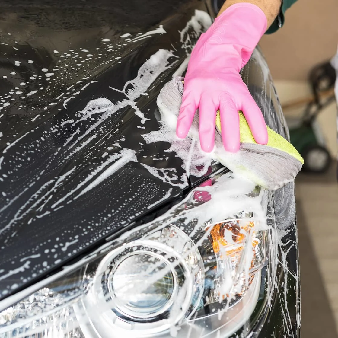 Washing car with sponge