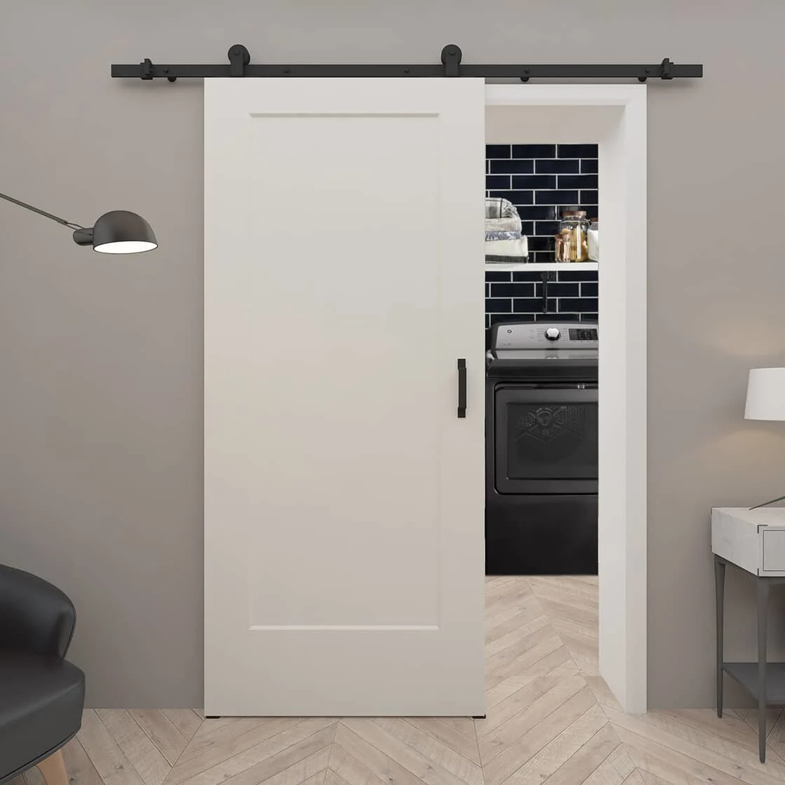 Laundry room behind a barn door