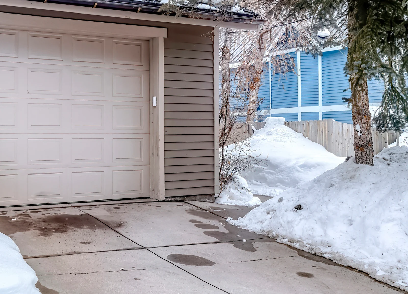 Snow starting to melt on driveway