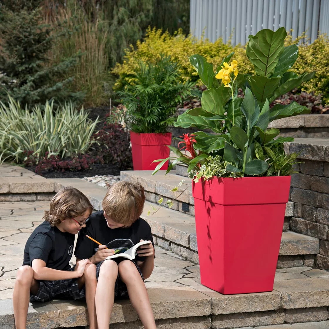 Two kids sit on the steps