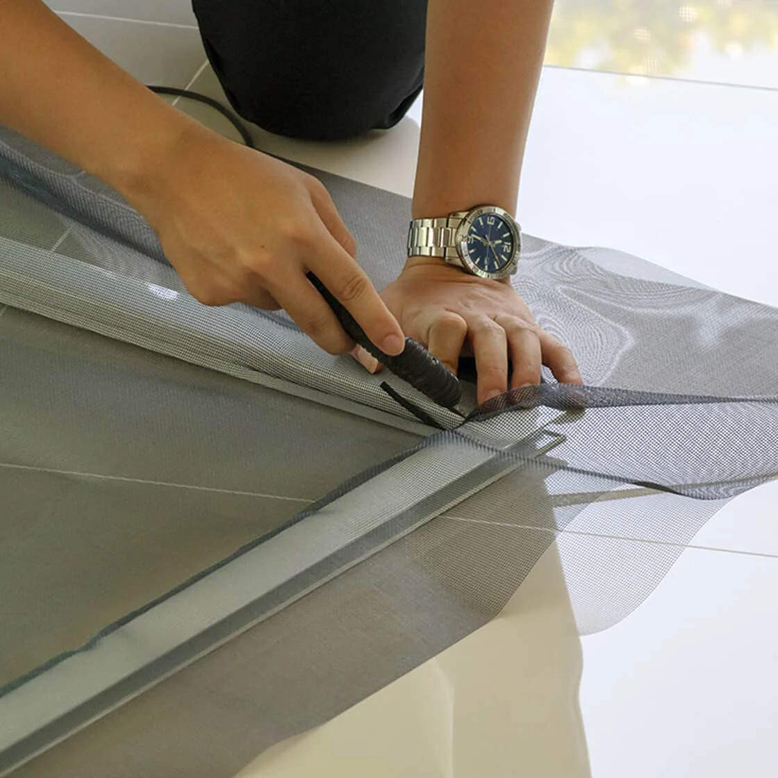 Person installing a screen