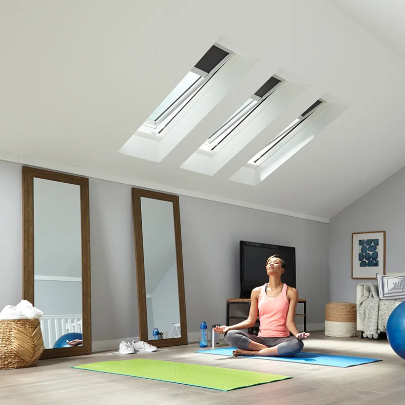 A yoga room with skylights