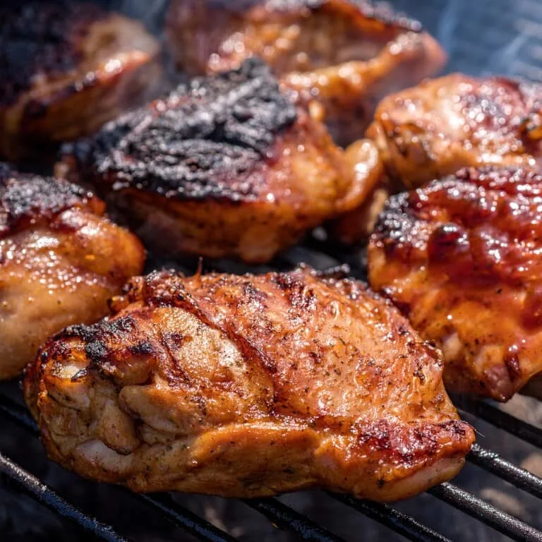 chicken thighs and legs on the BBQ