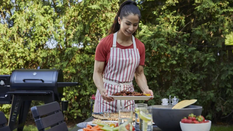 A woman grilling