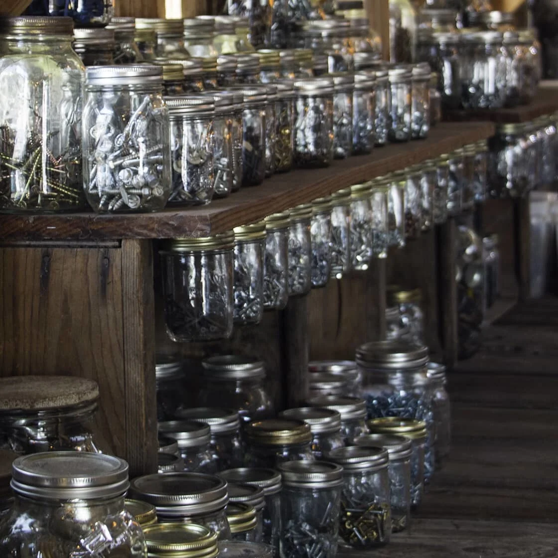 Row of mason jars suspended by the lids _1120x1120