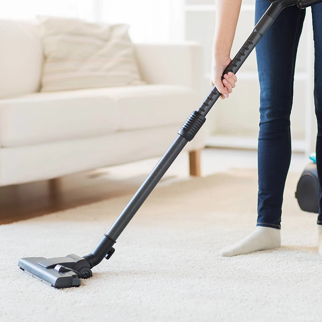 Someone uses a vacuum