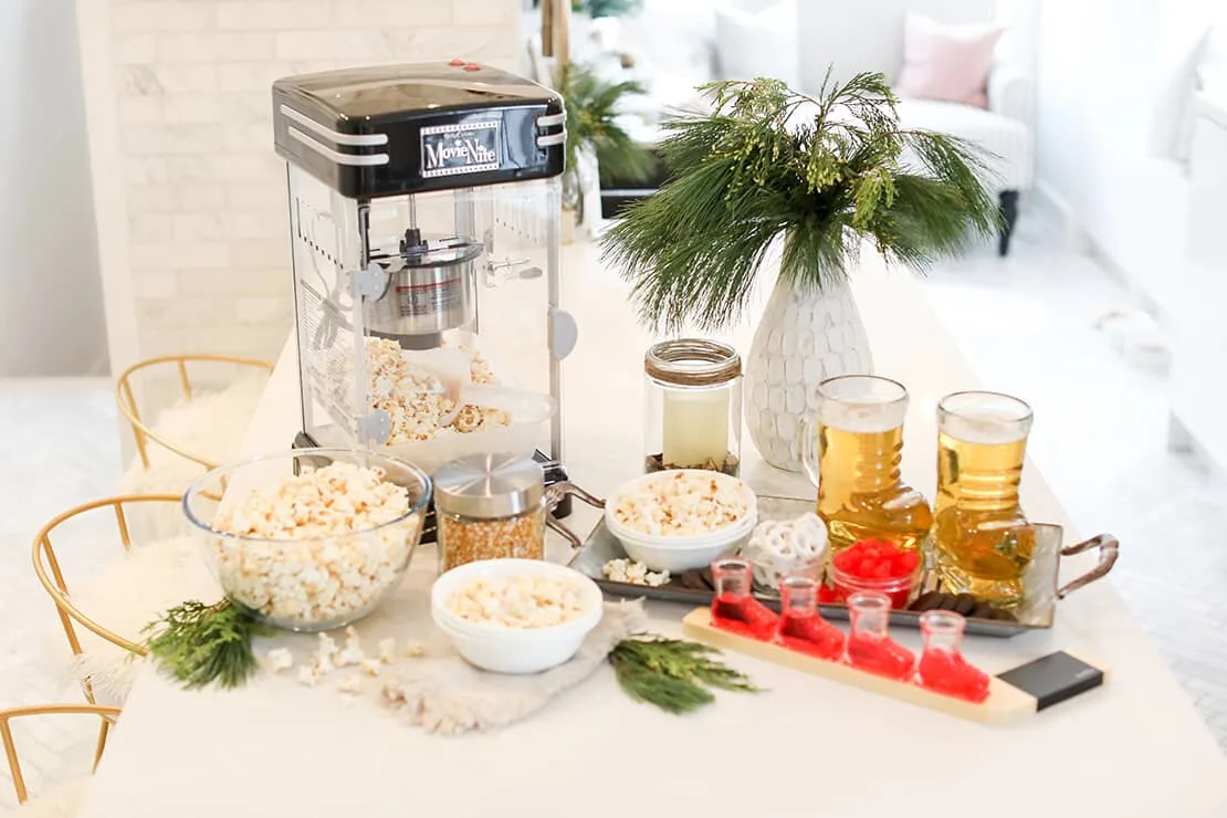 popcorn machine with popcorn and beer mugs