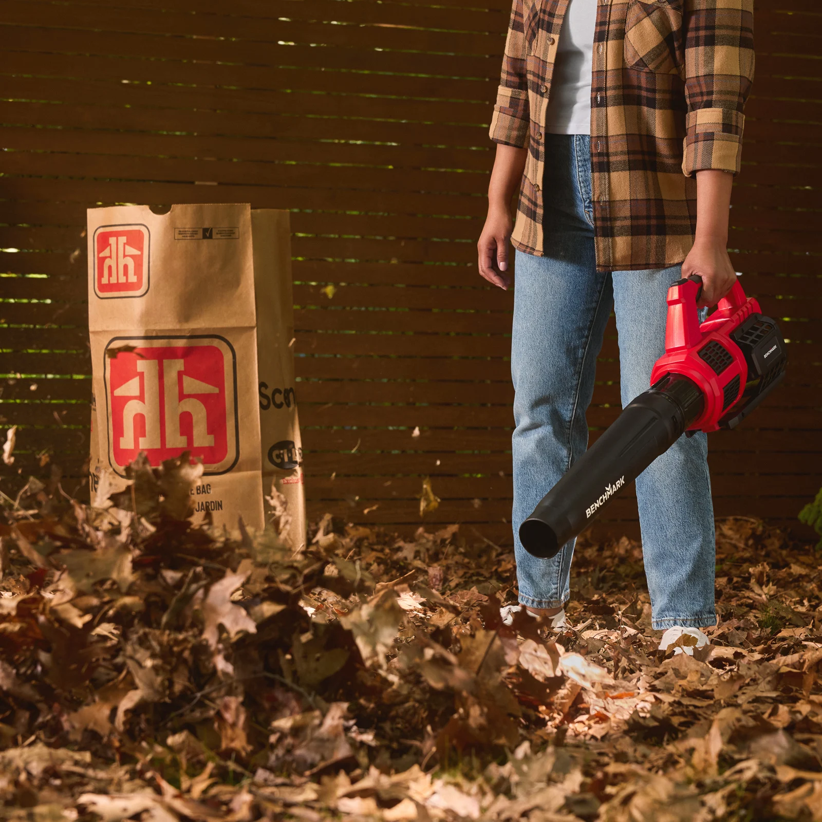 Woman using a leaf blower