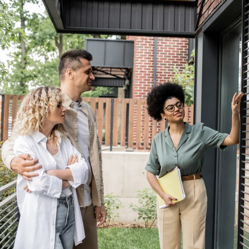 A couple tours a home 