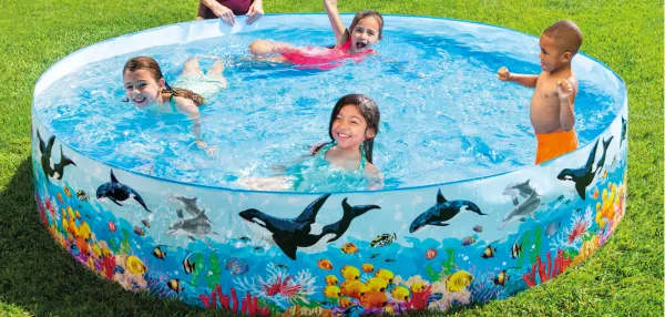 Children swimming in an above ground pool