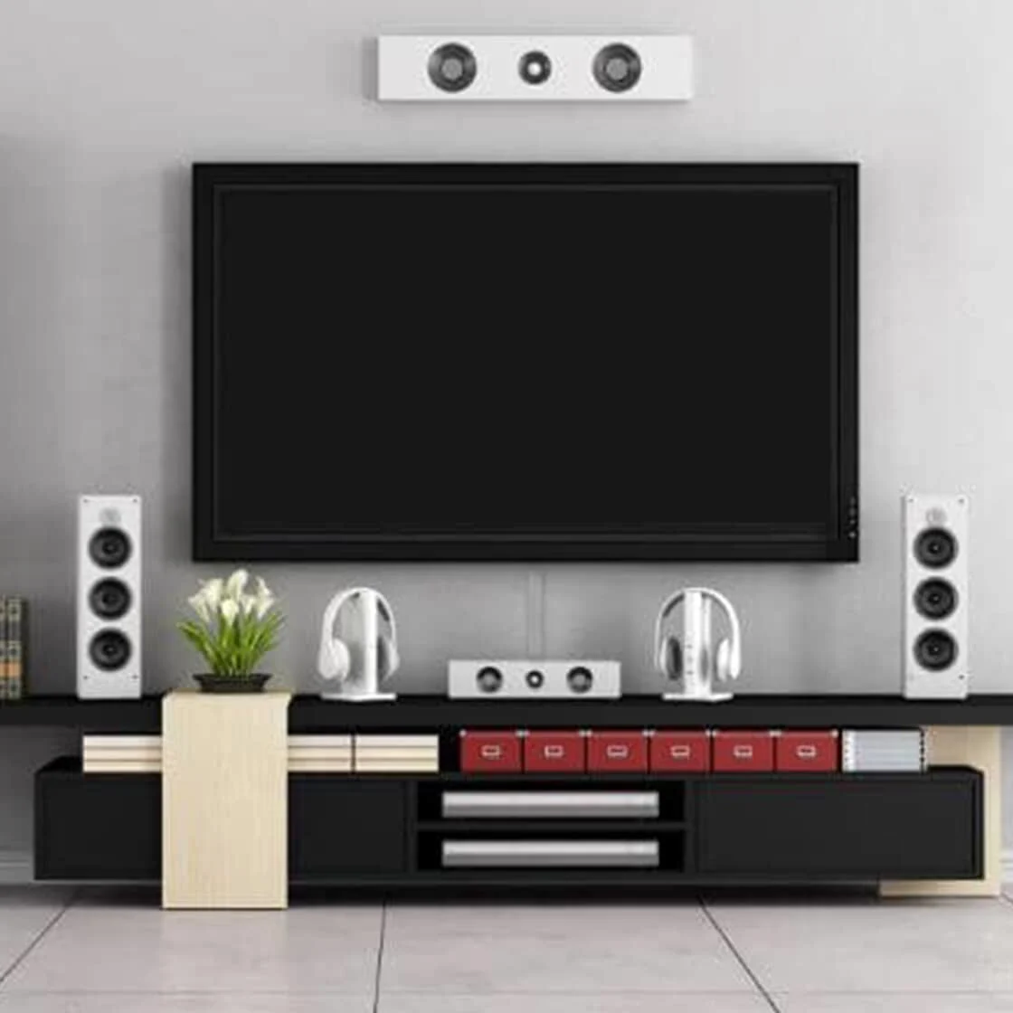 A TV with speakers and headphones