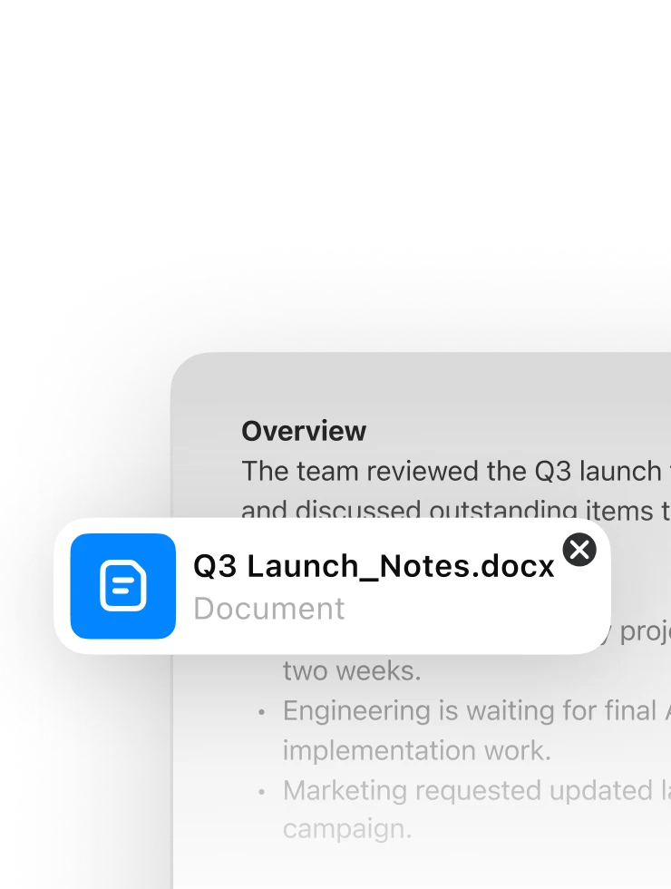 Asiakirjan esikatselu, jossa on liitekortti tiedostolle ”Q3 Launch_Notes.docx” asetettuna projektin yleiskatsauksen päälle.