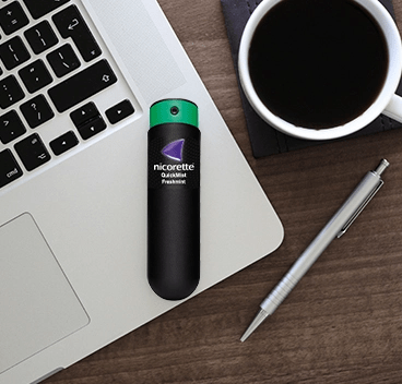 Nicorette QuickMist, computer og kaffekop