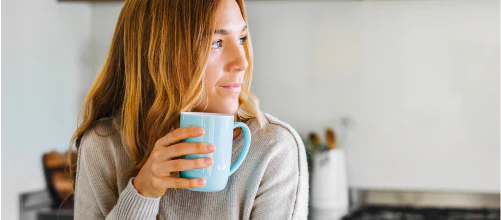 Woman holding a mug