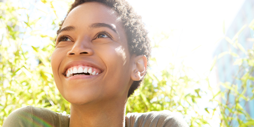 Person smiling outdoors