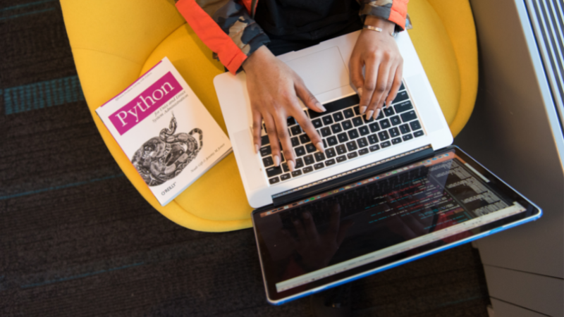 student-typing-on-laptop