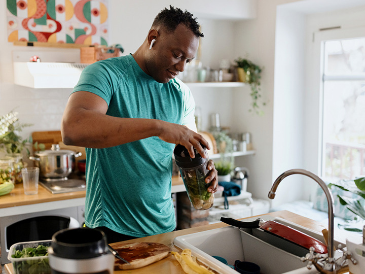 Runner making smoothie