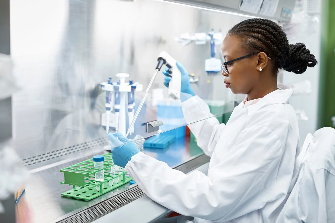 Woman cleaning lab