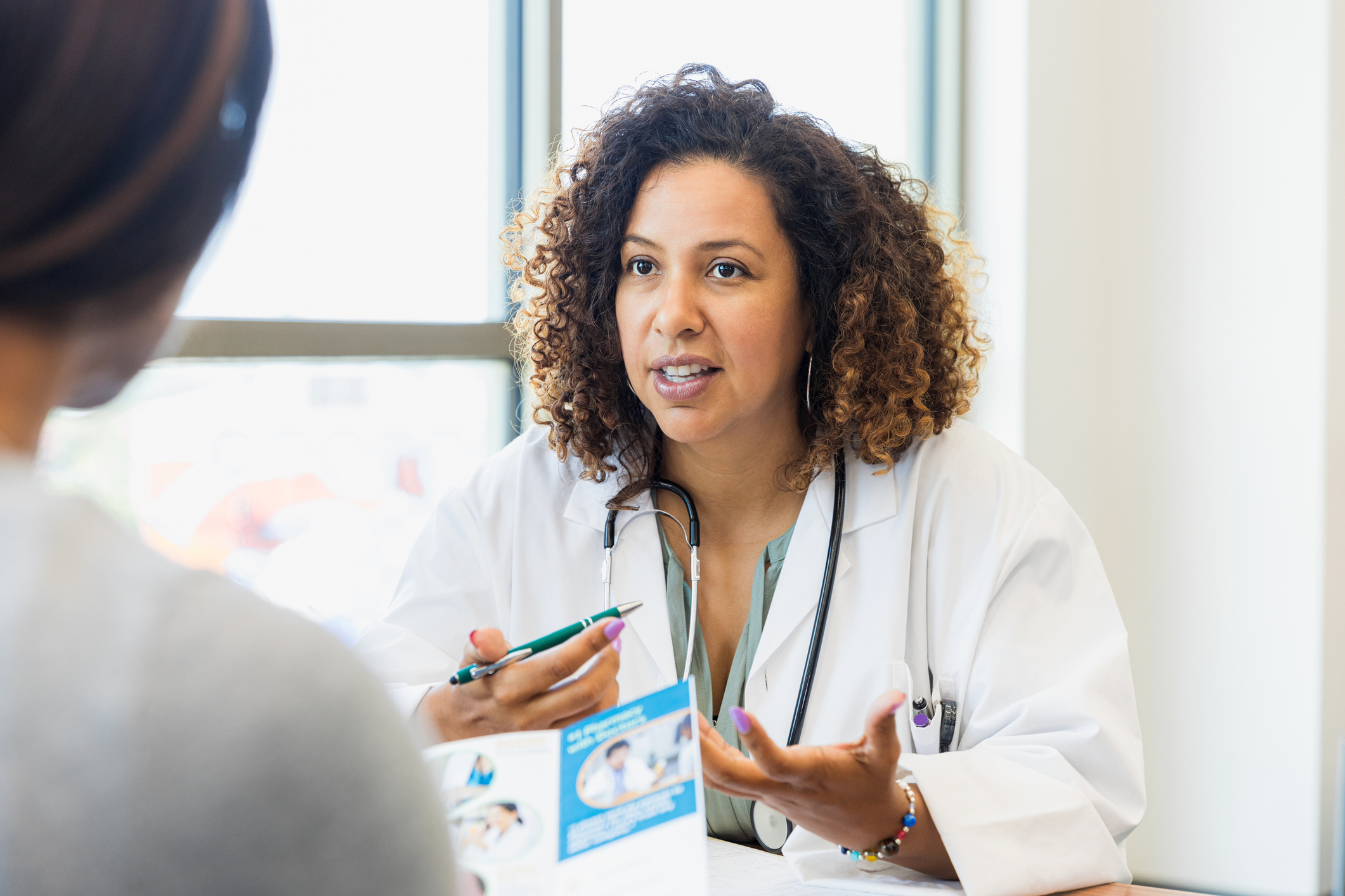 Female doctor counseling patient