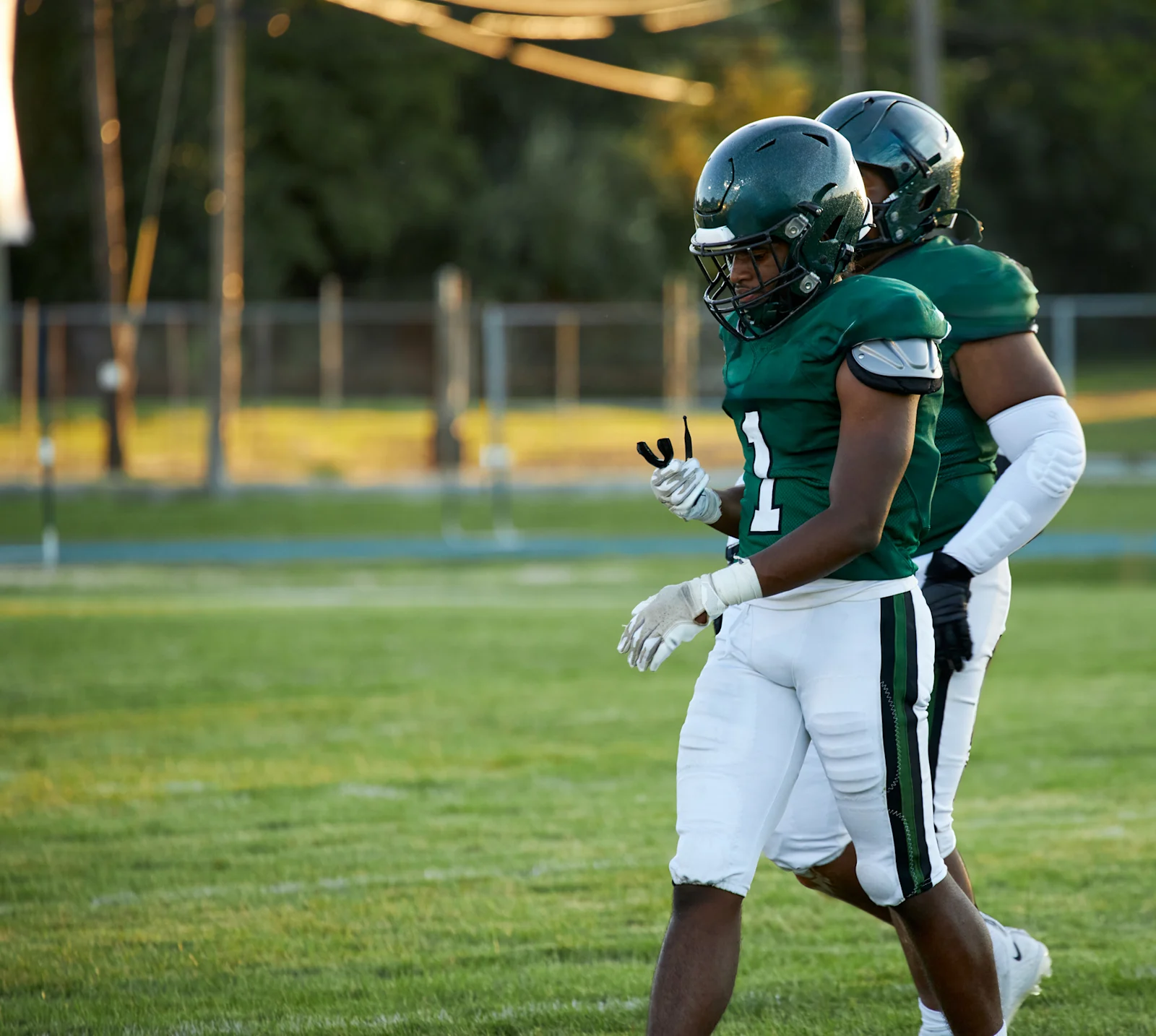 Football players running