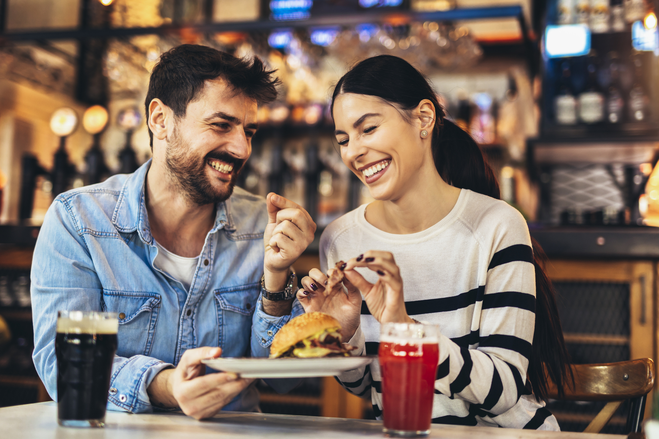 Couple sharing food