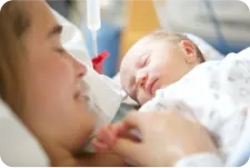 Mother with newborn baby