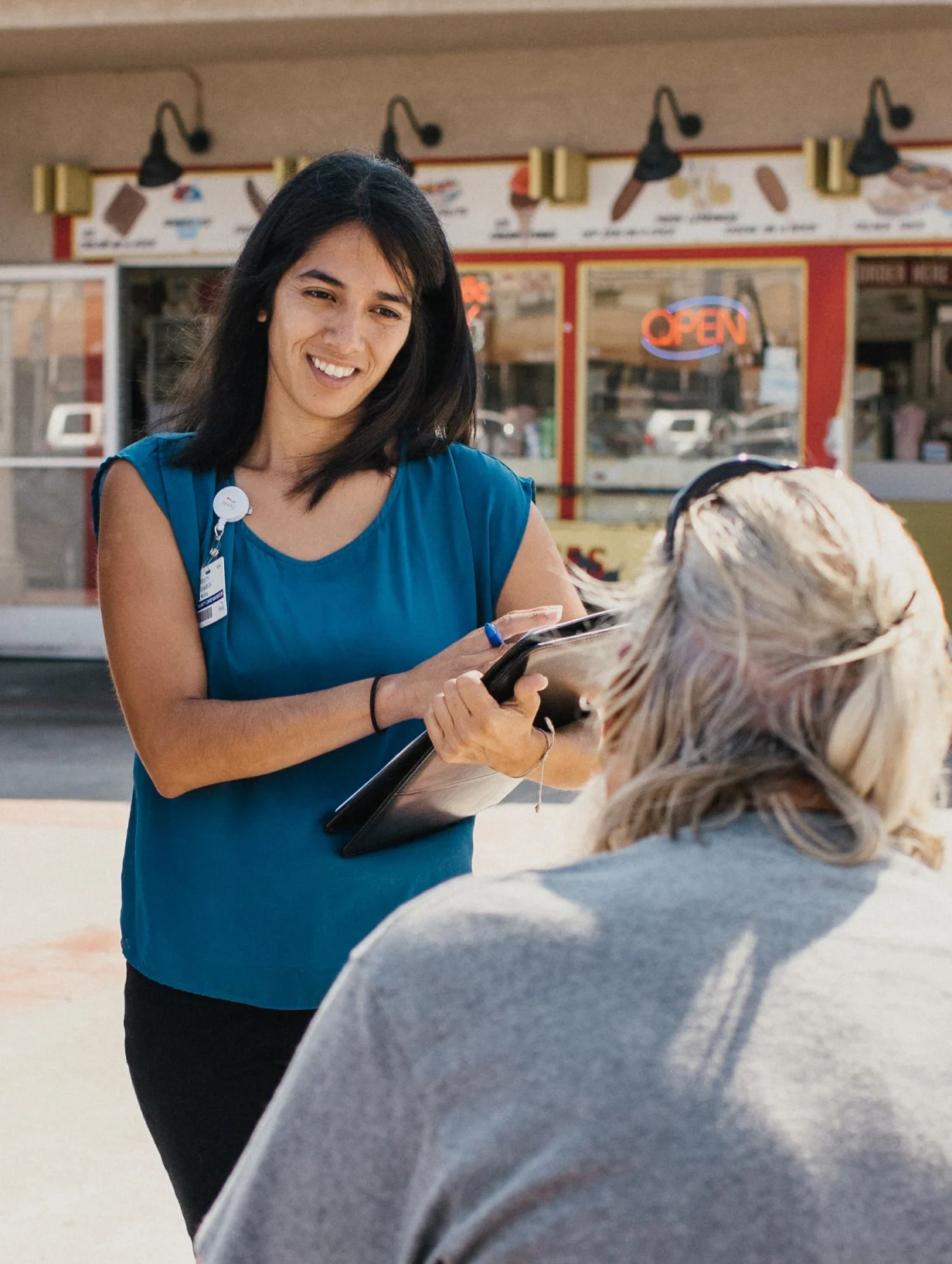 Volunteer talking to patient