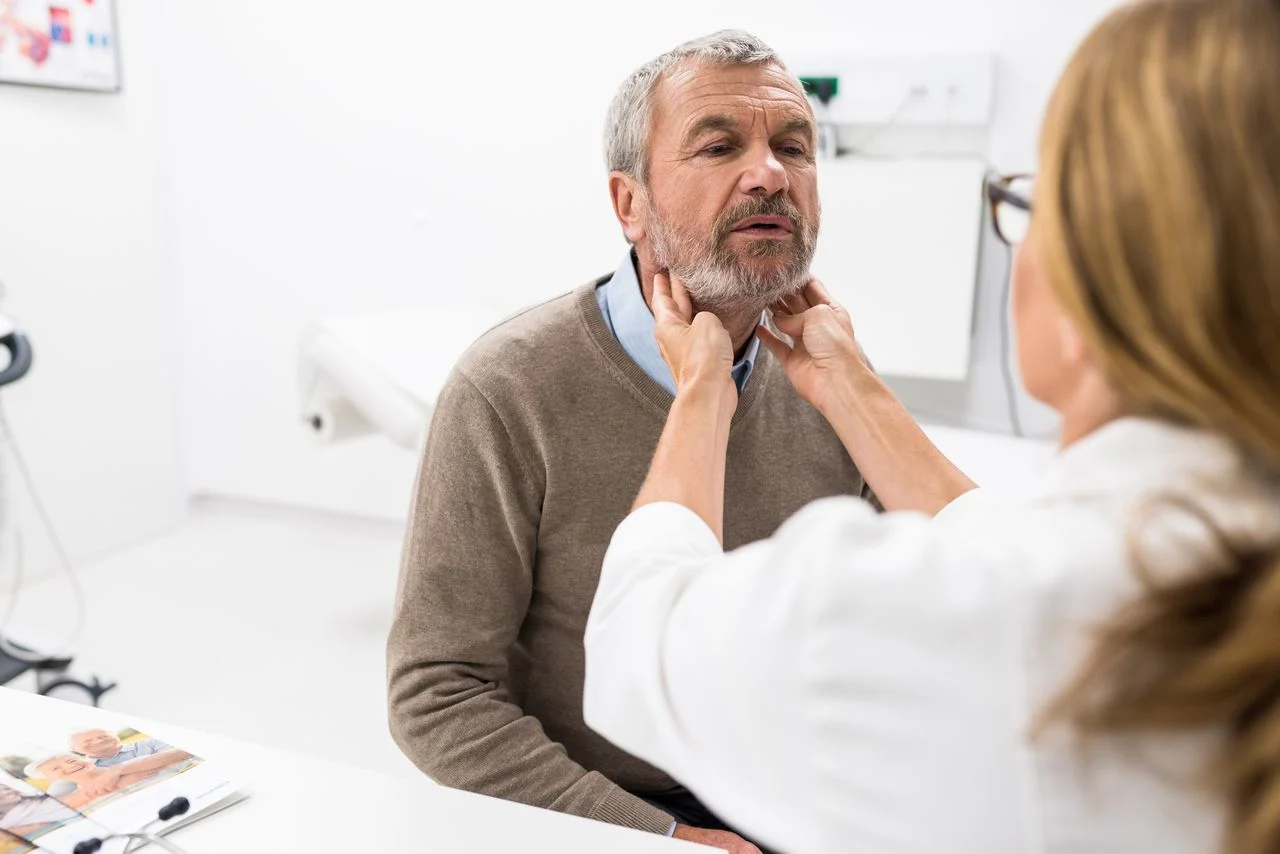 Checking a man's lymph nodes